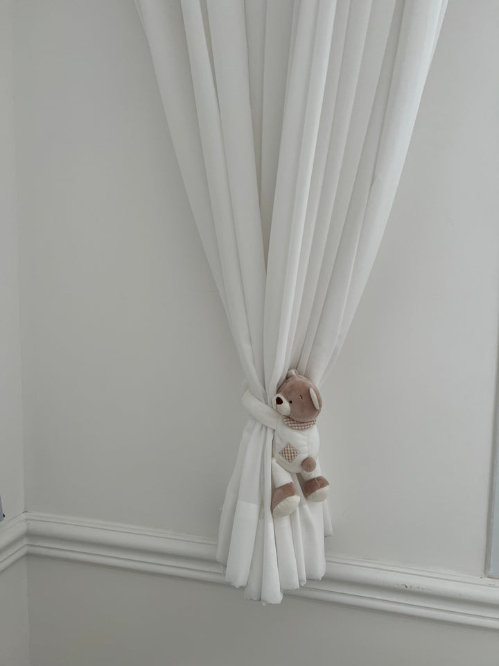 A pair of curtain holders - beige